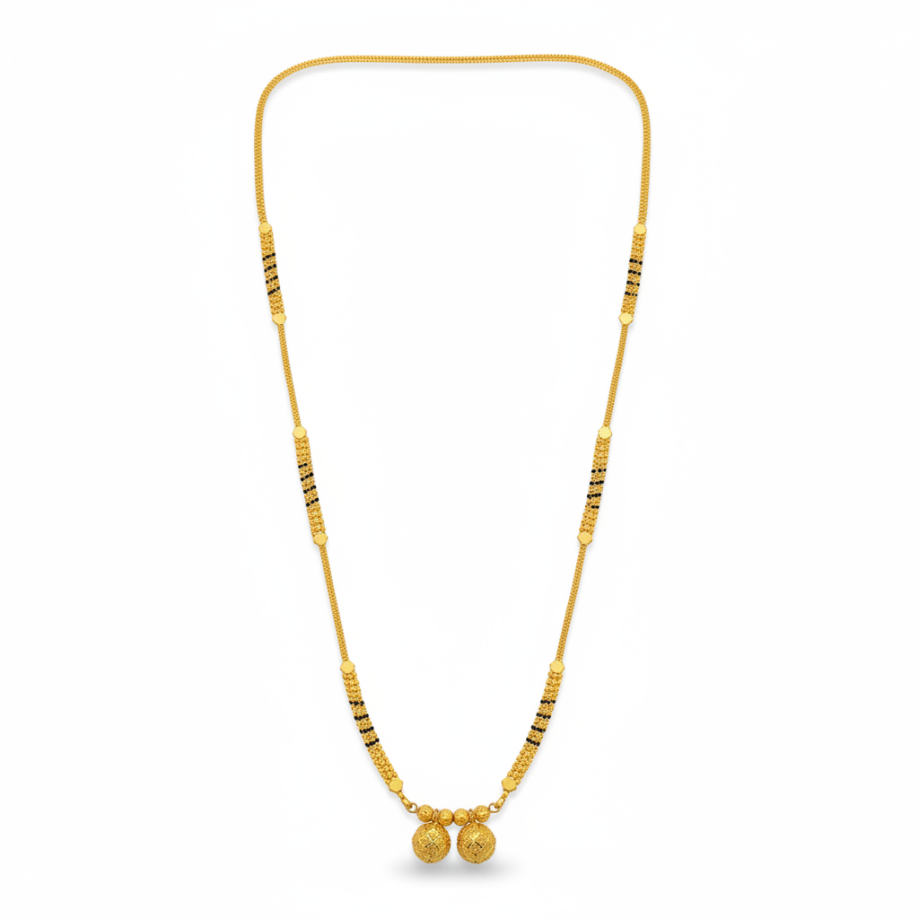 A long 30-inch Maharashtrian Vati Mangalsutra made of gold with black beads and a double-sphere pendant.